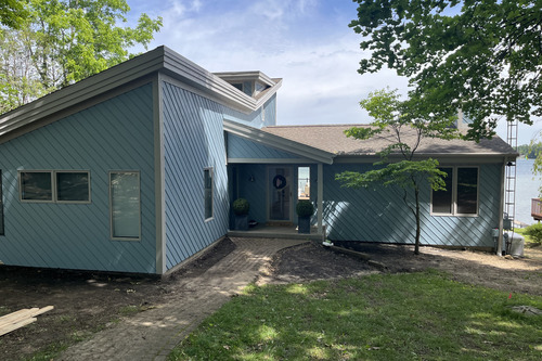 A blue Ann Arbor home painted by Mussio Painting local painters
