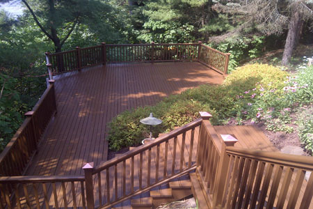 Exterior Painters showcase a stained deck outside of an Ann Arbor home
