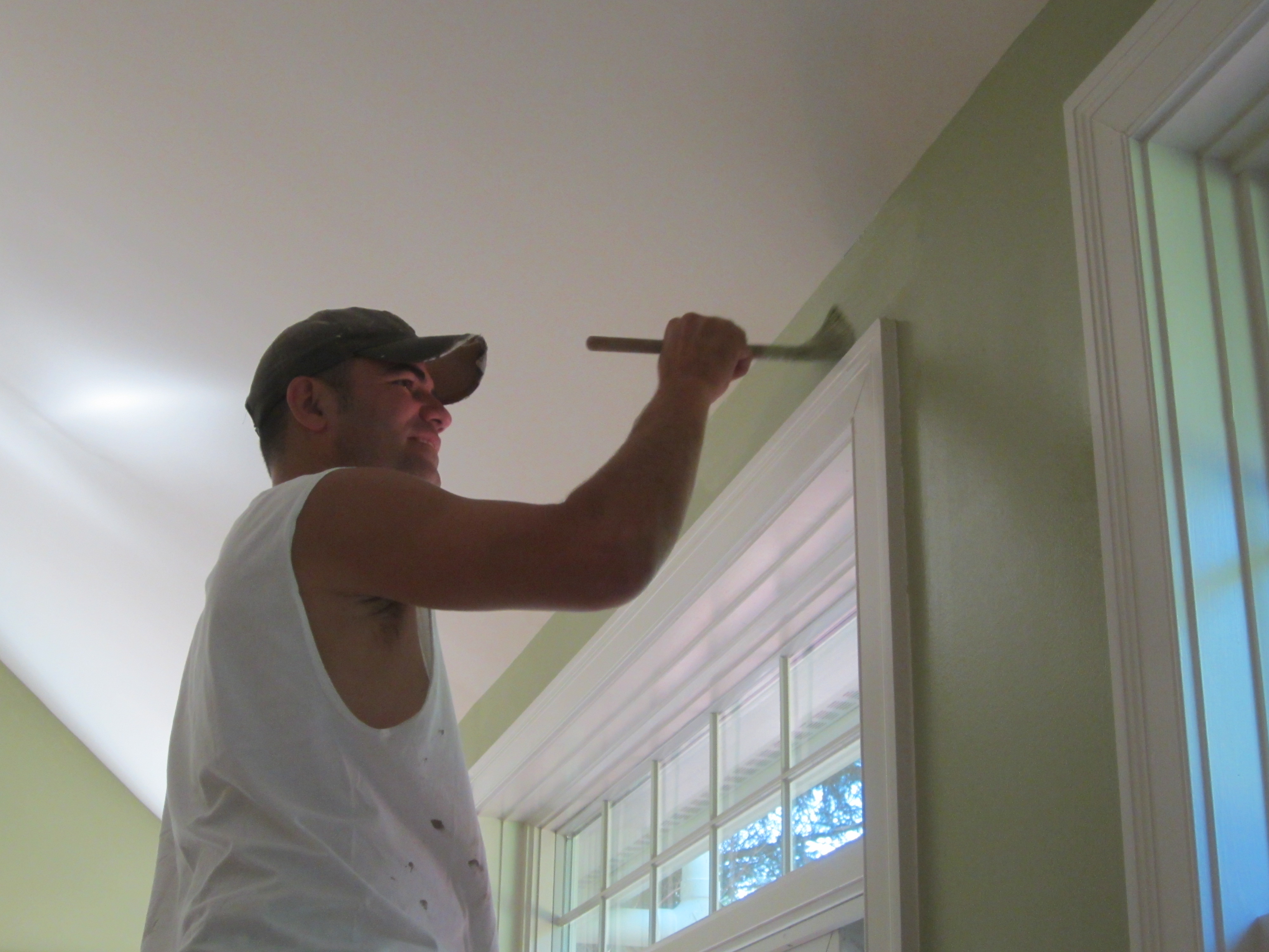 Professional Painters onsite in Ann Arbor painting large home room